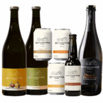 Assorted bottles and cans of cider in the online Traditional Cider Pack